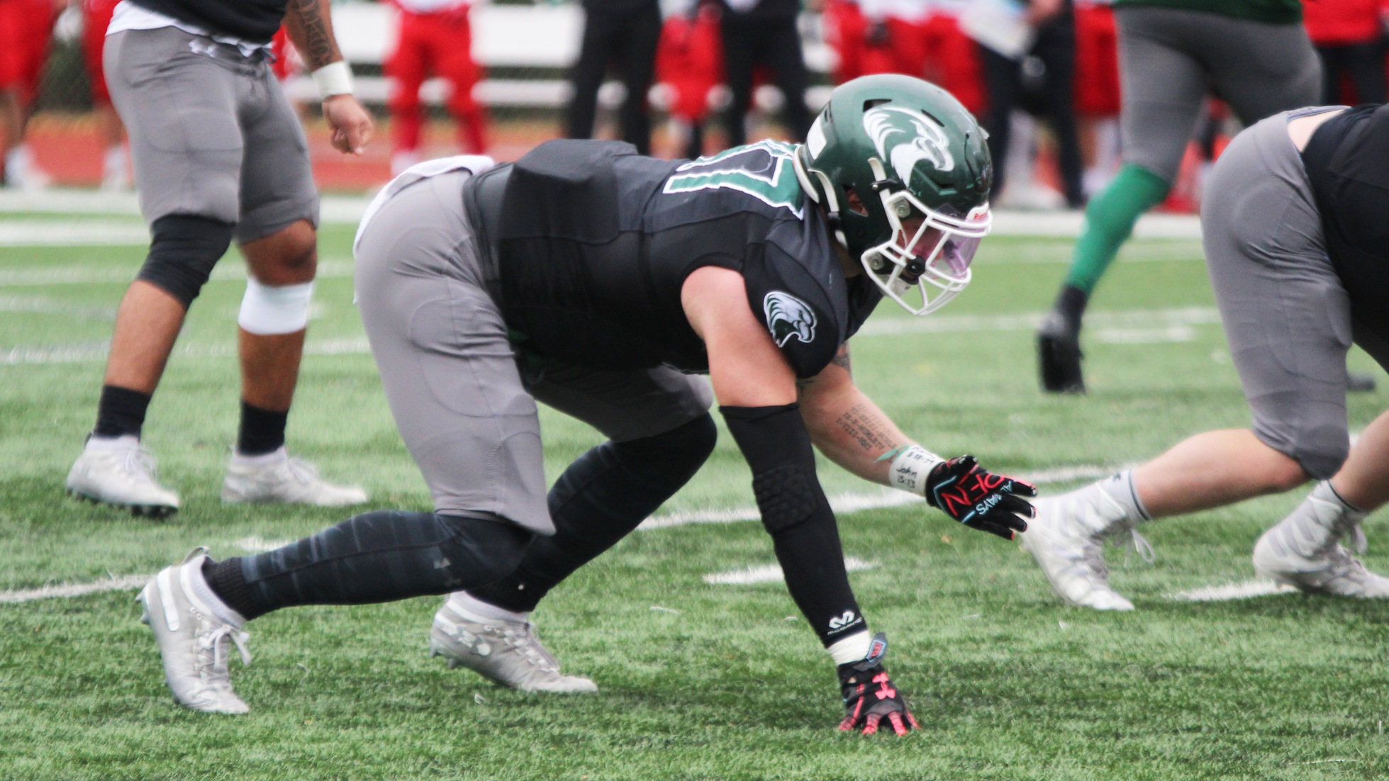 Football falls to Baker in Baldwin City Saturday